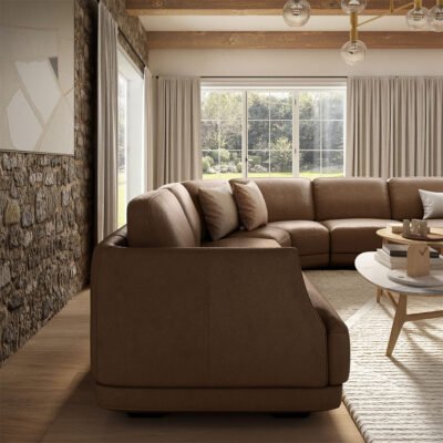Natuzzi Carter sofa - shown in leather. And side profile showing the curved sofa
