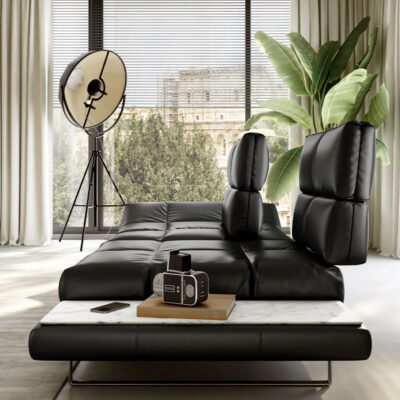 Natuzzi Roma - in black leather and showing side table detail